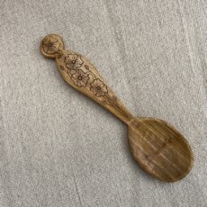 7” hand carved eating spoon. Cherry with kolrose pattern. Tung oil finish.
