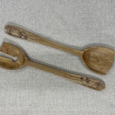 12” hand carved salad servers. Cherry with kolrose pattern and tung oil finish.