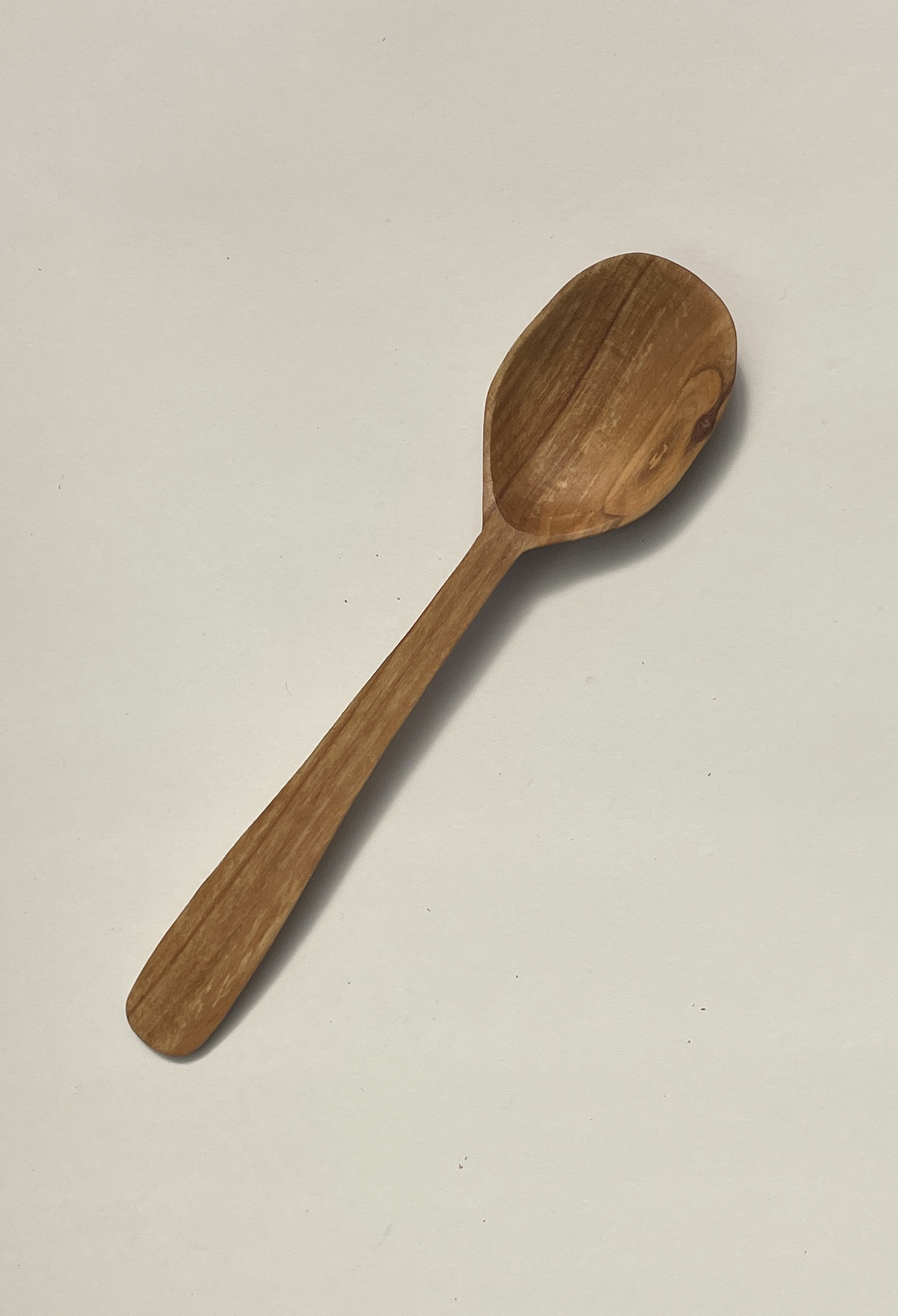 7½” hand carved eating spoon. Cherry with tung oil finish.