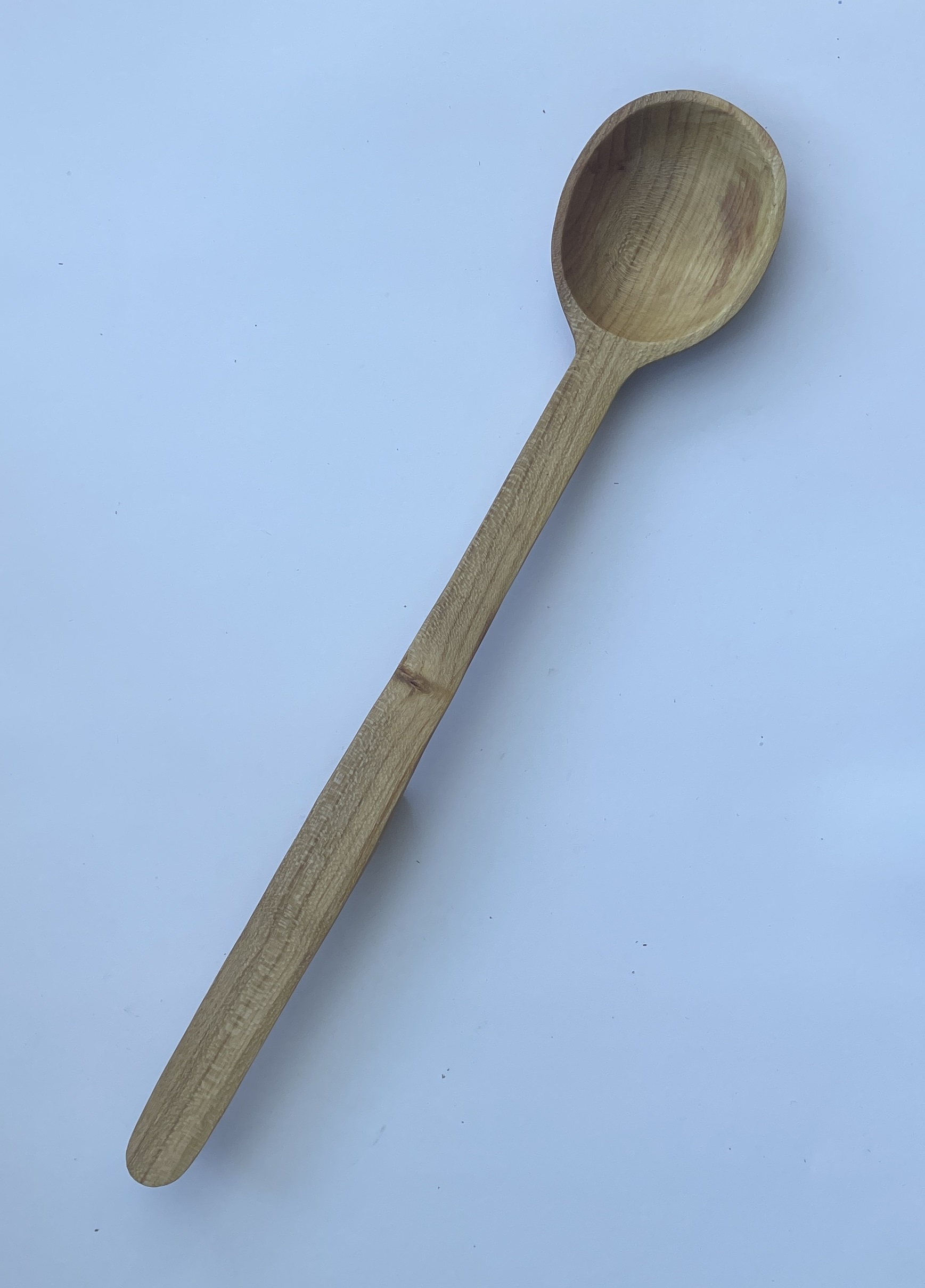 11½” hand carved cooking spoon. Plum with tung oil finish.